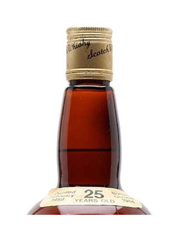 Dumbarton 1959 CA  Dumpy Bottle - White label